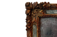 Beautiful early 18th Century French carved gilt wood cushion mirror with foxed glass