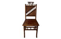 Antique chair made of bamboo with embossed leather seat 