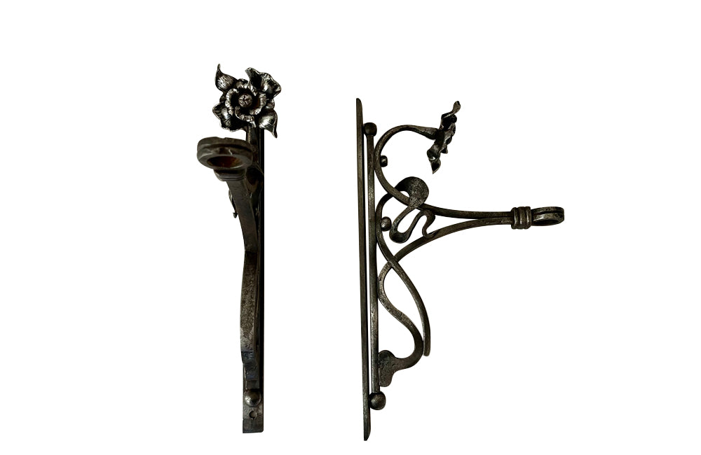 Pair of beautiful 19th Century Art Nouveau iron wall brackets of lovely quality.