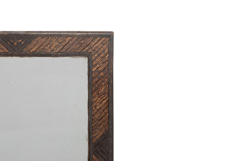 Charming tramp art framed mirror made with hazelnut twigs circa late 19th century.