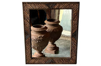 Charming tramp art framed mirror made with hazelnut twigs circa late 19th century.