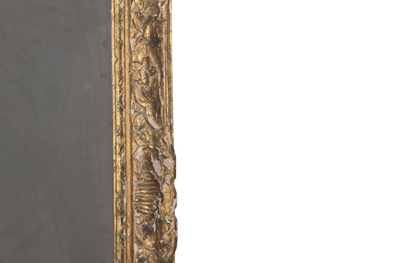 Beautiful 19th century French carved giltwood framed mirror with lovely patination.