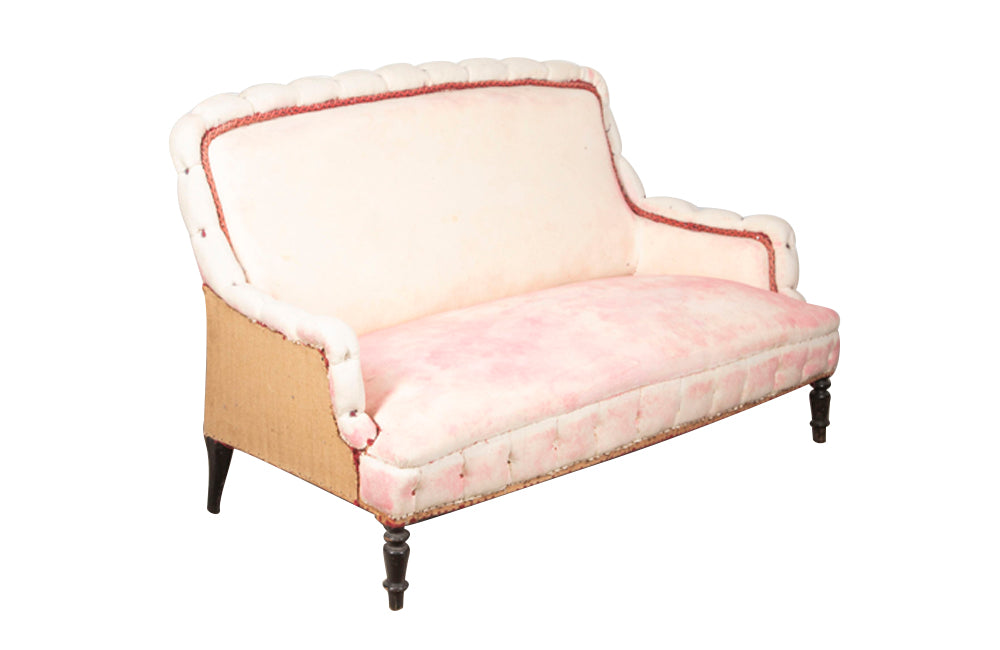 Beautiful large Napoleon III piecrust sofa on ebonised feet. 