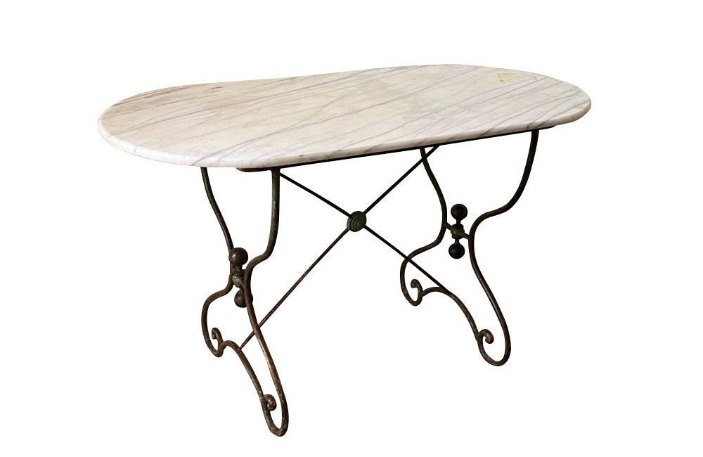 19th Century beautiful French boucherie, or patisserie, presentation table with iron base and oval marble top - French Antique Furniture