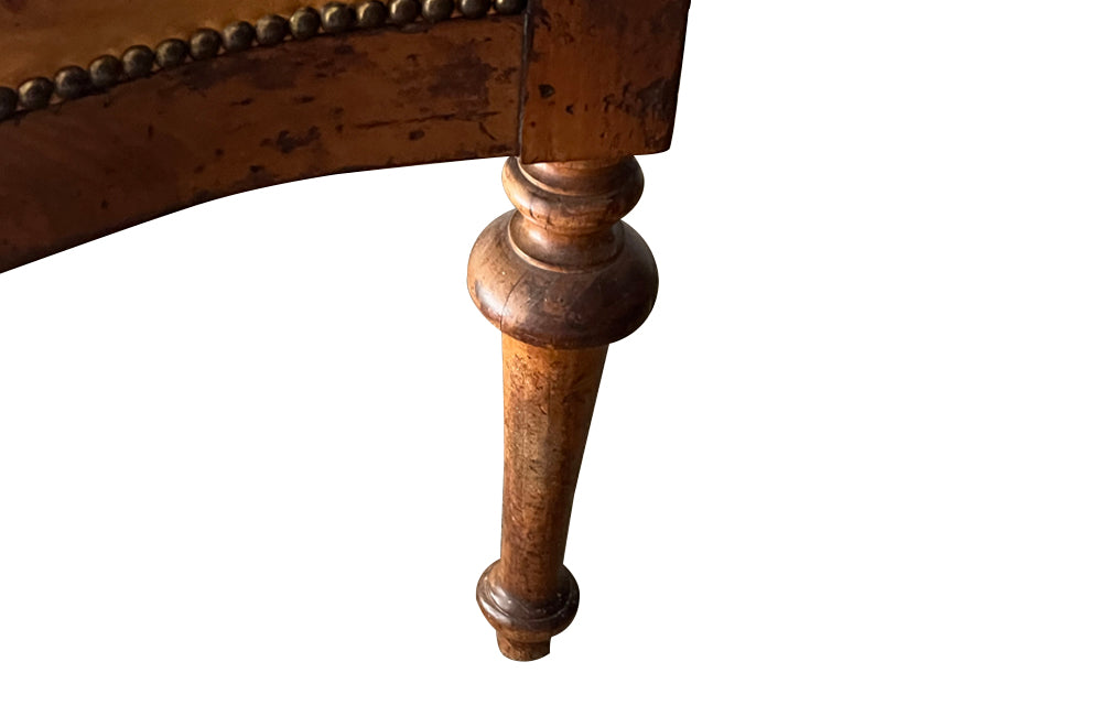 19th century French, walnut desk chair with leather seat and back. Napoleon III.