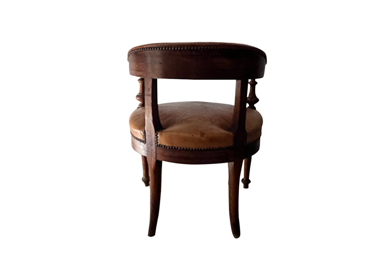 19th century French, walnut desk chair with leather seat and back. Napoleon III.