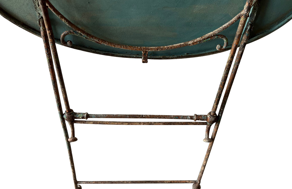 19th century French folding oval iron garden table with lovely blue colour and patination