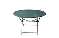 19th century French folding oval iron garden table with lovely blue colour and patination