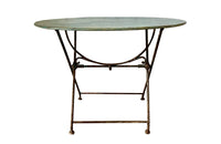 19th century French folding oval iron garden table with lovely blue colour and patination