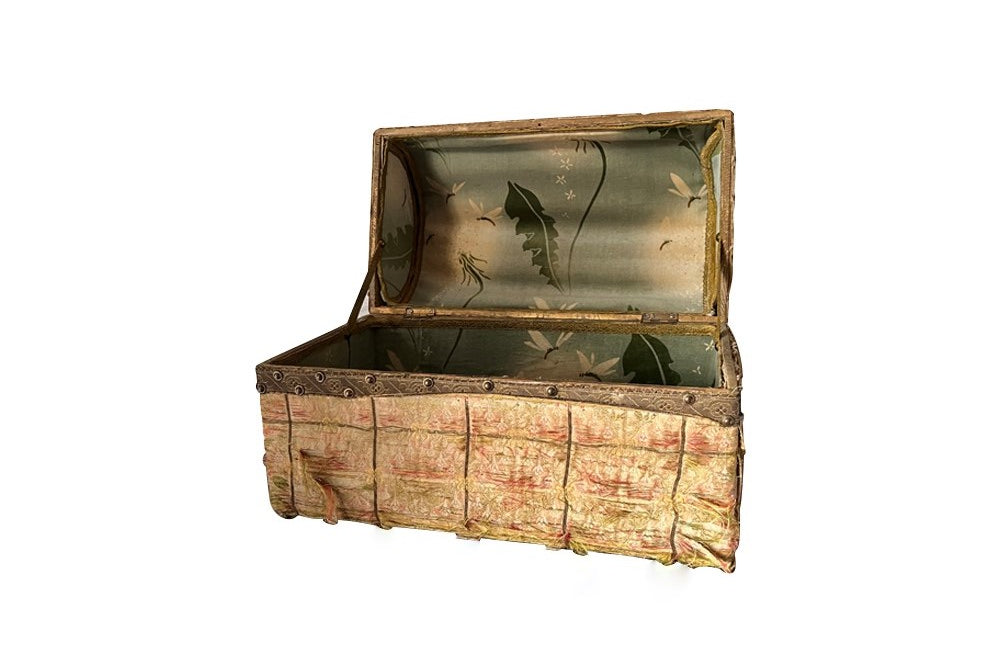 19th century domed marriage coffer covered in pretty silk fabric and studded braid.