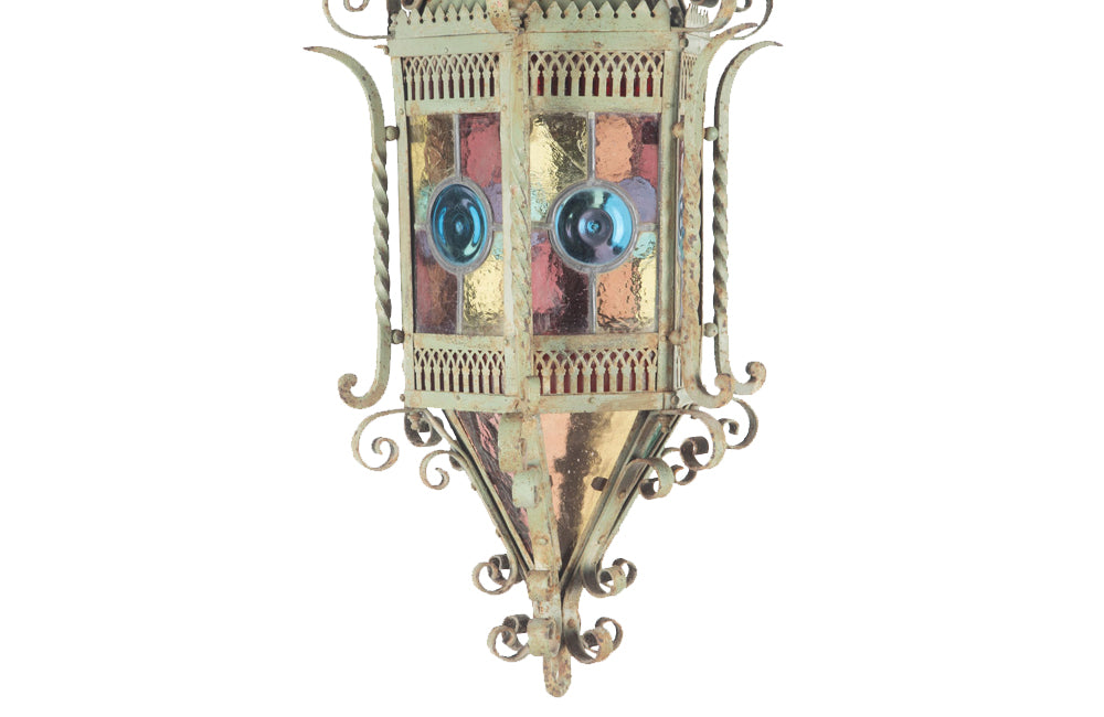 19th century iron lantern in the Neo-Gothic style with wonderful scrolled and pierced decoration and fretwork.