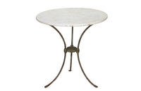 Antique iron garden table with splayed legs and pretty cast iron central floral medallion. Garden antiques