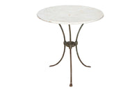 Antique iron garden table with splayed legs and pretty cast iron central floral medallion. Garden antiques