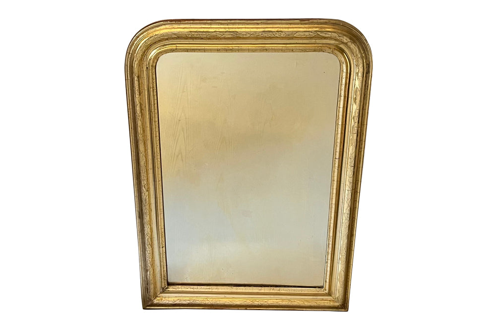 Antique mirror Gilt Louis Philippe French 19th Century with floral and foliate decoration.