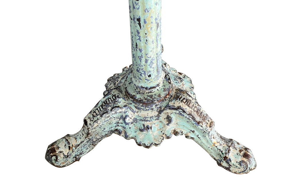 Antique bistro table with quatrefoil clover shaped marble top and enamelled iron base. French. foundry stamps to feet of Charlionais Pourailly & Cie