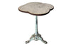 Antique bistro table with quatrefoil clover shaped marble top and enamelled iron base. French. foundry stamps to feet of Charlionais Pourailly & Cie
