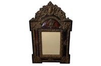 Antique mirror Louis XIV style French with faux tortoiseshell veneer and repousee brass decoration. Richly decorated with floral, foliate and fruit motif.