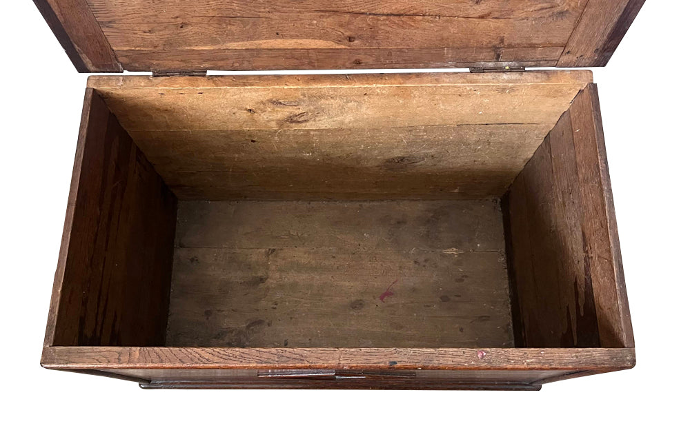 Charming 19th Century French lidded oak trunk with heart motif.