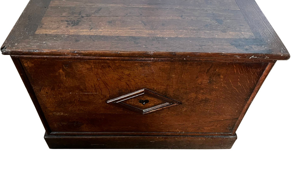 Charming 19th Century French lidded oak trunk with heart motif.