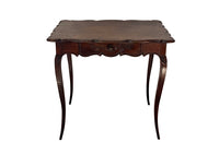 Small 19th Century French oak writing table in the Louis XV style.