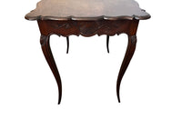 Small 19th Century French oak writing table in the Louis XV style.