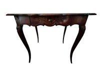 Small 19th Century French oak writing table in the Louis XV style.