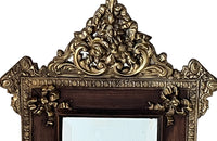 Antique mirror 19th Century French. With brass and glass floral ornamented pediment.