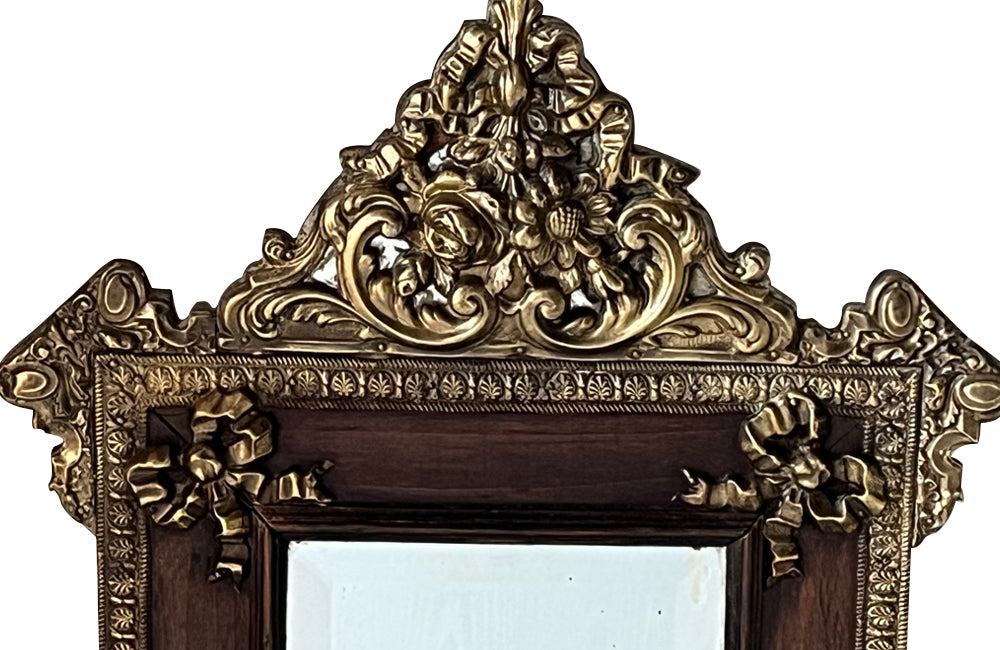 Antique mirror 19th Century French. With brass and glass floral ornamented pediment.