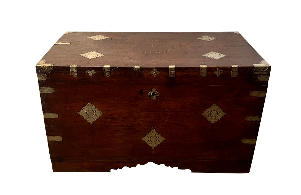 19th Century Anglo-Indian teak lidded trunk with brass ornamentation.