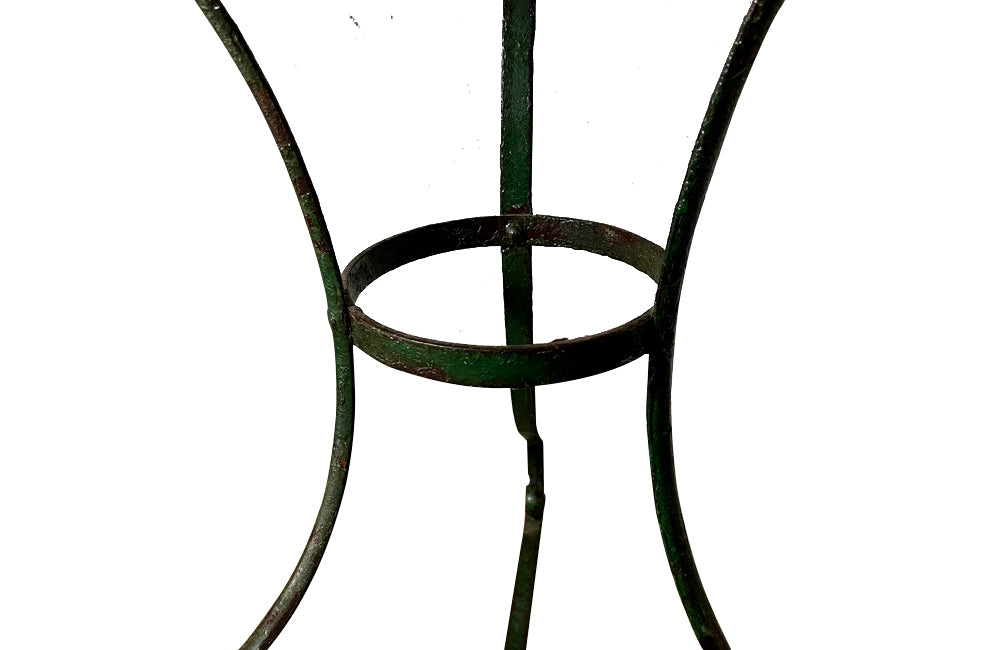 French iron round garden table with old green paint to base circa 1900