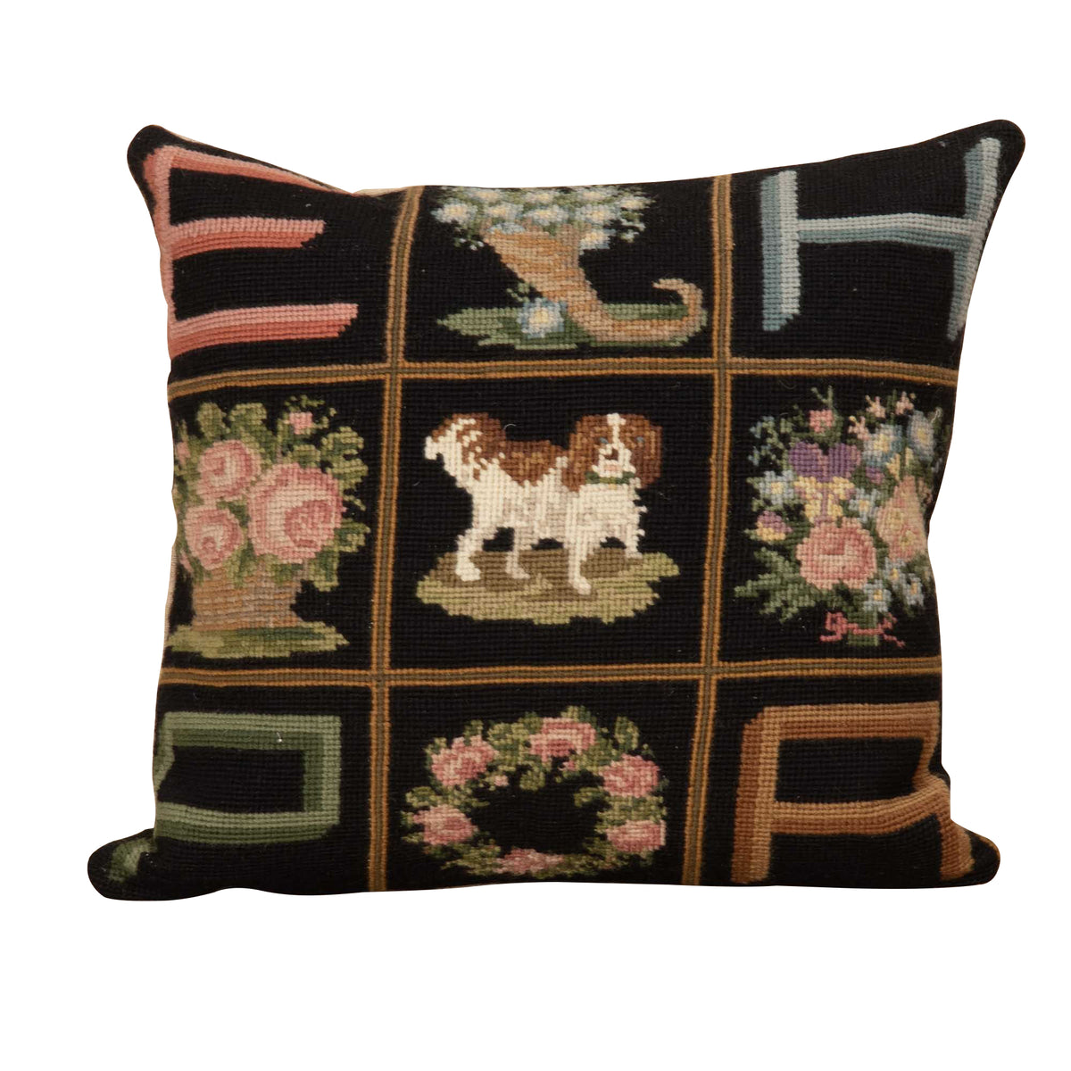 A finely worked 19th Century French needlepoint monogram pillow with King Charles spaniel motif.