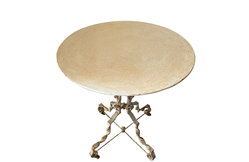 Antique iron table French orangery table on twisted iron base with feet terminating on casters. French Antique Furniture.