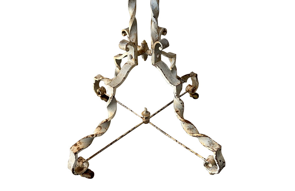 Antique iron table French orangery table on twisted iron base with feet terminating on casters. French Antique Furniture.