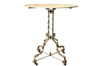 Antique iron table French orangery table on twisted iron base with feet terminating on casters. French Antique Furniture.