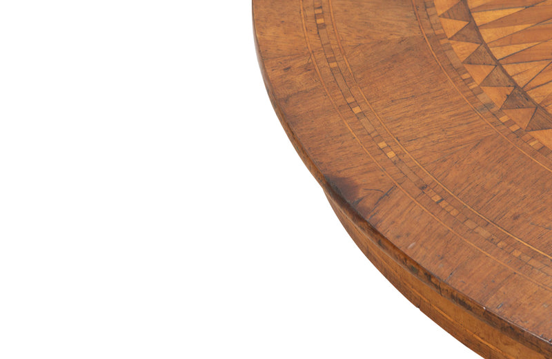 Elegant 19th century Italian walnut parquetry centre table on decorative tripod base.