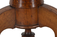 Elegant 19th century Italian walnut parquetry centre table on decorative tripod base.