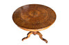 Elegant 19th century Italian walnut parquetry centre table on decorative tripod base.