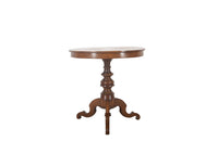 Elegant 19th century Italian walnut parquetry centre table on decorative tripod base.