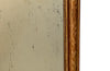 Antique mirror French Louis Philippe giltwood 19th Century with beaded inner surround and Neo-Classical foliate decoration to the frame.
