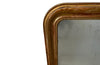 Antique mirror French Louis Philippe giltwood 19th Century with beaded inner surround and Neo-Classical foliate decoration to the frame.