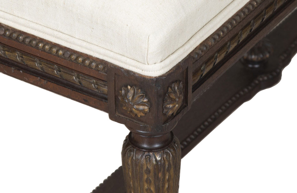 Elegant late 19th Century French walnut bench in the style of Louis XVI.