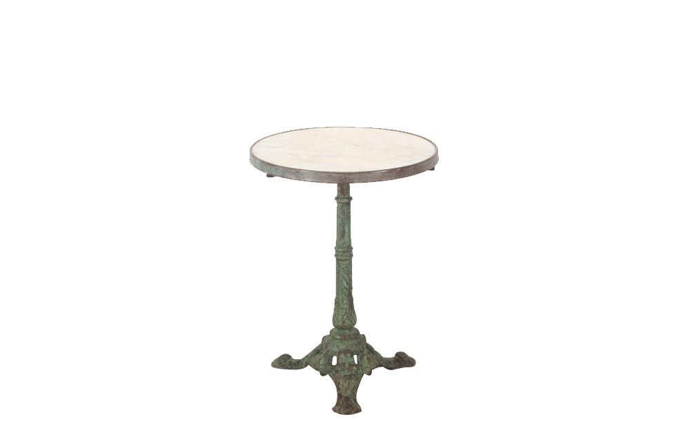 Beautiful, 19th century round bistro table with decorative iron base and marble top with brass surround.