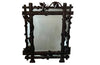 19th century black forest carved frame mirror
