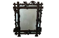 19th century black forest carved frame mirror