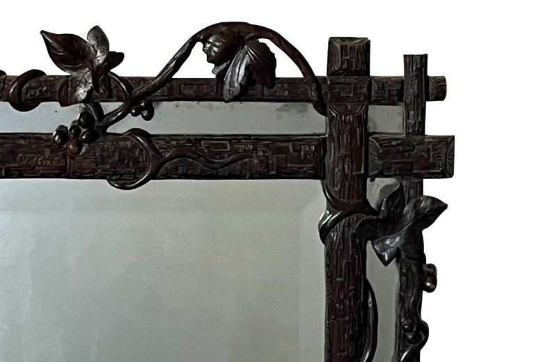 19th century black forest carved frame mirror