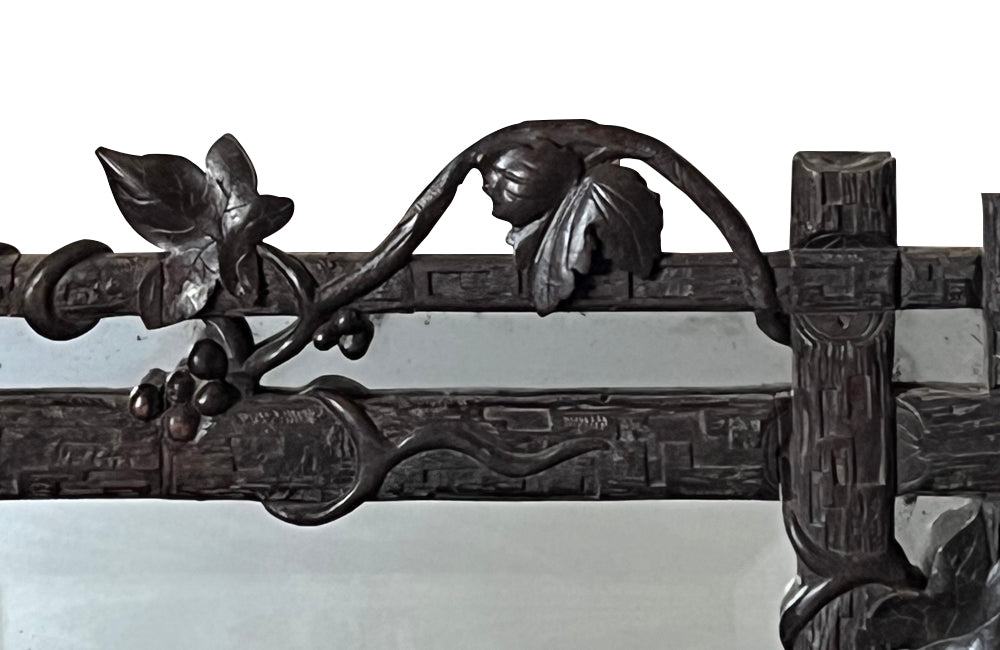 19th century black forest carved frame mirror