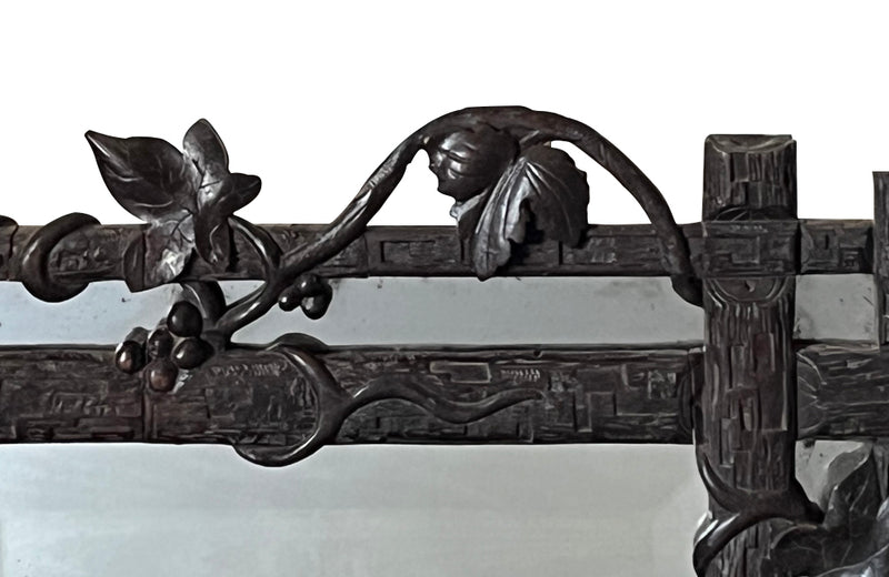 19th century black forest carved frame mirror