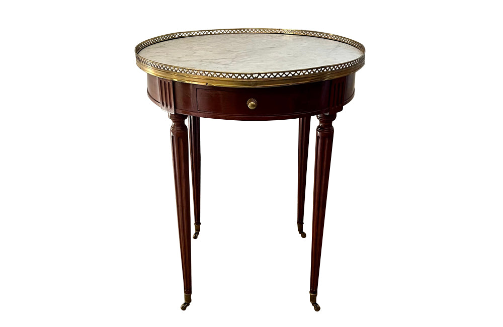 Elegant 19th Century French Louis XVI Revival mahogany and oak lined round bouillotte table