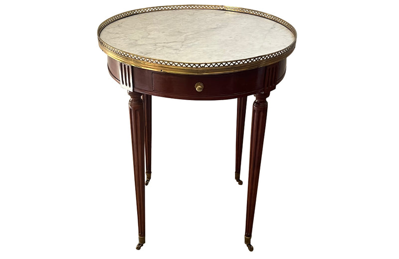 Elegant 19th Century French Louis XVI Revival mahogany and oak lined round bouillotte table