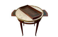 Elegant 19th Century French Louis XVI Revival mahogany and oak lined round bouillotte table